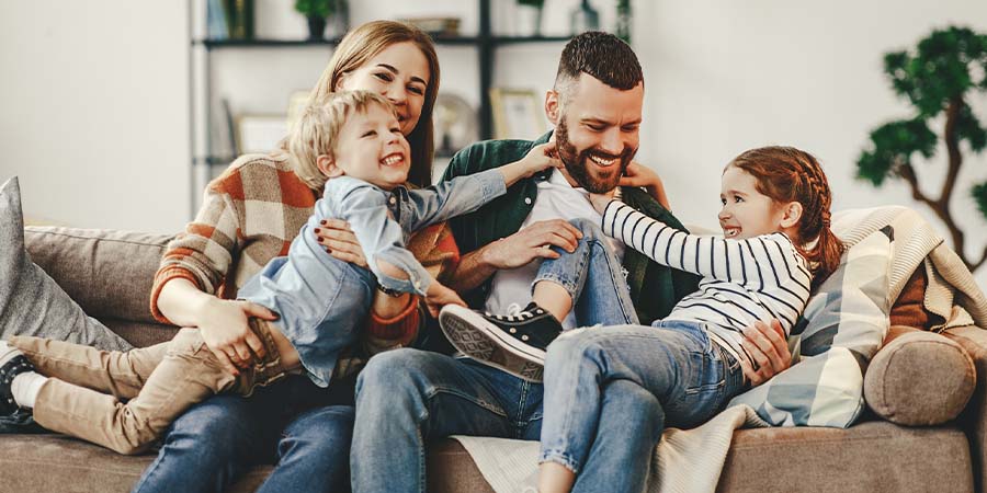 Family enjoying AC indoors