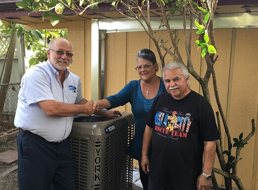Dealer shaking hands with homeowner